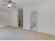 Large main bedroom features neutral carpet, ceiling fan and ensuite bath with closet at 148 Cowrie Ct, Mount Pleasant, SC 29464