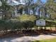 Entrance to Dorothy B. Kearns Park in Mount Pleasant, featuring lush greenery and a welcoming sign at 148 Cowrie Ct, Mount Pleasant, SC 29464