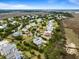 Aerial view of a residential neighborhood showcasing the home and the surrounding landscape at 1500 Bower Ln, Johns Island, SC 29455