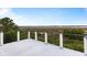 This deck has a view of the water and the surrounding trees and vegetation at 1500 Bower Ln, Johns Island, SC 29455