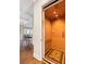 Residential elevator featuring wood paneled walls and a decorative rug at 1500 Bower Ln, Johns Island, SC 29455
