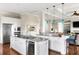 Bright kitchen with a large island, modern appliances, and an open concept design at 1500 Bower Ln, Johns Island, SC 29455