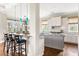 Modern kitchen featuring granite countertops, a breakfast bar, and stainless steel appliances at 1500 Bower Ln, Johns Island, SC 29455