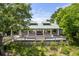 Relax on this charming outdoor deck with ample seating at 1500 Bower Ln, Johns Island, SC 29455