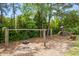 Community playground with a swing set and play structure at 1500 Bower Ln, Johns Island, SC 29455
