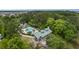 Aerial view of the pool area featuring lush greenery and lounge seating at 1500 Bower Ln, Johns Island, SC 29455