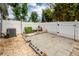 Fenced backyard with a patio, gravel, green bench, landscaping, and privacy at 151 Kirkland St, Goose Creek, SC 29445