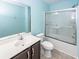 Bright bathroom featuring a single sink vanity, toilet, and tiled shower/tub at 151 Kirkland St, Goose Creek, SC 29445