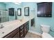 Bathroom with a double sink vanity, medicine cabinet, and a shower with a glass door at 151 Kirkland St, Goose Creek, SC 29445