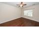Bright bedroom with ceiling fan, natural light from the window, and hardwood floors at 151 Kirkland St, Goose Creek, SC 29445