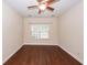 Bright bedroom with ceiling fan, natural light from the window, and hardwood floors at 151 Kirkland St, Goose Creek, SC 29445