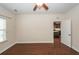 Bright bedroom with ceiling fan, natural light from the window, and hardwood floors at 151 Kirkland St, Goose Creek, SC 29445