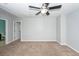 Spacious carpeted bedroom with ceiling fan and light-colored walls at 151 Kirkland St, Goose Creek, SC 29445