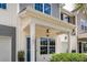 Welcoming entrance with covered porch, detailed trim, and a beautiful blue front door at 151 Kirkland St, Goose Creek, SC 29445