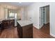 Modern kitchen features granite countertops, an island, stainless steel appliances, and hardwood floors at 151 Kirkland St, Goose Creek, SC 29445