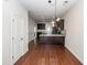 Open-concept kitchen featuring stainless steel appliances, granite countertops, and dark wood cabinetry at 151 Kirkland St, Goose Creek, SC 29445