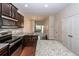 Modern kitchen features granite countertops, an island, stainless steel appliances, and hardwood floors at 151 Kirkland St, Goose Creek, SC 29445