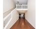 Spacious living room with hardwood floors, staircase, and open to the kitchen at 151 Kirkland St, Goose Creek, SC 29445