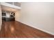 Open-concept living room with hardwood floors and a view into the kitchen at 151 Kirkland St, Goose Creek, SC 29445