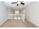 Loft area with ceiling fan and views of the downstairs at 151 Kirkland St, Goose Creek, SC 29445