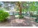 Backyard featuring a swing under a mature tree and a picnic table at 1575 Langston Dr, Johns Island, SC 29455