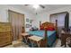 Cozy bedroom with a queen-sized bed, side tables, and a ceiling fan at 1575 Langston Dr, Johns Island, SC 29455