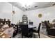 Dining area with a round table, four chairs, chandelier, and personal decorations at 1575 Langston Dr, Johns Island, SC 29455