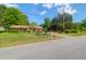 Charming single-story home with a well-manicured lawn and inviting curb appeal at 1575 Langston Dr, Johns Island, SC 29455