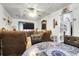 Comfortable living room featuring a ceiling fan, large TV, and an open doorway to the rest of the house at 1575 Langston Dr, Johns Island, SC 29455