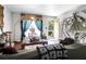 Cozy living room with hardwood floors, large windows, and stylish decor at 1575 Langston Dr, Johns Island, SC 29455