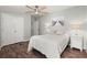 Cozy bedroom features a ceiling fan, white furniture and ample closet space at 1616 Refuge Run, Charleston, SC 29412
