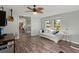 Cozy living room with hardwood floors, bright windows, and comfortable seating at 1616 Refuge Run, Charleston, SC 29412