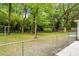 This home has a lush backyard with a fence and storage shed at 1621 Point Park Dr, Johns Island, SC 29455