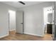 Neutral bedroom features vinyl floors, grey walls, and white trim at 1621 Point Park Dr, Johns Island, SC 29455
