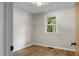 Small bedroom with vinyl floors and a window at 1621 Point Park Dr, Johns Island, SC 29455