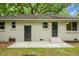 This home's backyard includes a patio and a freshly painted exterior at 1621 Point Park Dr, Johns Island, SC 29455