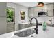 Modern kitchen with sleek countertops, stainless steel appliances, and ample natural light at 1621 Point Park Dr, Johns Island, SC 29455