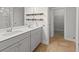 Well-lit bathroom with a double sink vanity, modern fixtures, and ample storage at 1661 Indy Dr, North Charleston, SC 29405