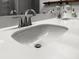 Close-up of bathroom sink with chrome faucet and white countertop at 1661 Indy Dr, North Charleston, SC 29405