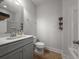 Full bathroom featuring tile floors, vanity, toilet, and shower/tub combo at 1661 Indy Dr, North Charleston, SC 29405