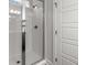 Modern bathroom showcasing a glass shower with white subway tile and chrome fixtures at 1661 Indy Dr, North Charleston, SC 29405