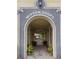 Charming community entrance to Mixson Shops with inviting archway and lush greenery at 1661 Indy Dr, North Charleston, SC 29405