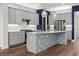 Modern kitchen with stainless steel appliances, ample cabinet space, a large island, and attractive backsplash at 1661 Indy Dr, North Charleston, SC 29405