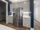 Kitchen featuring a stainless steel refrigerator, light cabinets and dark blue wall at 1661 Indy Dr, North Charleston, SC 29405