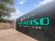 Welcoming Paradiso sign with lush greenery, inviting guests to dine, swim, and enjoy the vibe at 1661 Indy Dr, North Charleston, SC 29405
