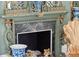 Ornate fireplace with detailed carvings and marble accents creates a focal point of historic beauty at 172 Tradd St, Charleston, SC 29401