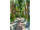 Picturesque garden featuring a central water fountain and symmetrical landscaping at 172 Tradd St, Charleston, SC 29401