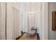 Stylish hallway with seating and a chandelier at 172 Tradd St, Charleston, SC 29401