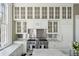 Gourmet kitchen featuring professional appliances, custom cabinetry, and marble countertops at 172 Tradd St, Charleston, SC 29401