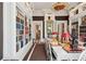 Charming library with custom bookshelves and sophisticated décor for a perfect reading sanctuary at 172 Tradd St, Charleston, SC 29401